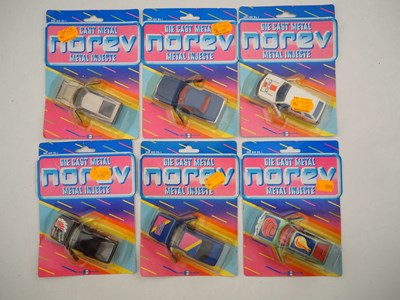Lot 681 - A group of NOREV diecast cars on original...