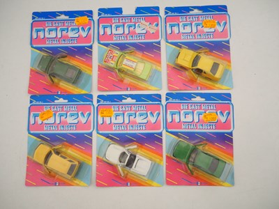 Lot 681 - A group of NOREV diecast cars on original...