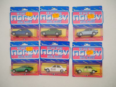 Lot 681 - A group of NOREV diecast cars on original...