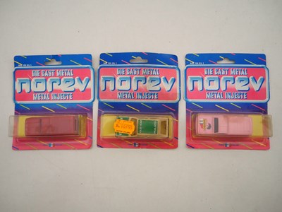 Lot 681 - A group of NOREV diecast cars on original...