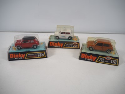 Lot 711 - A group of DINKY diecast Minis in original...
