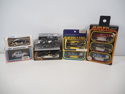 Lot 716 - A group of diecast Formula 1 and rally cars,...