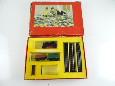 Lot 290 - A TRI-ANG R3.R clockwork goods starter train...