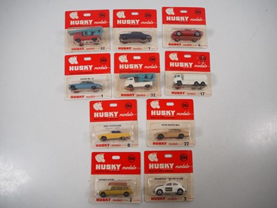 Lot 720 - HUSKY - A group of diecast vehicles sealed on...