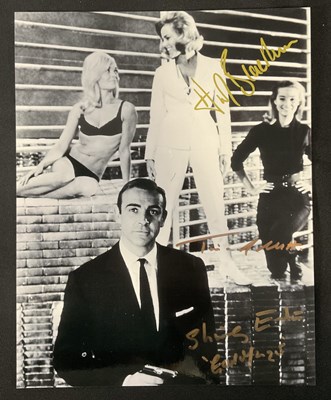Lot 574 - GOLDFINGER - A multi signed 8” x 10” still...