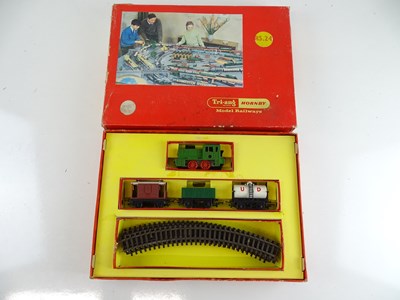 Lot 291 - A TRI-ANG RS.24 clockwork goods starter train...