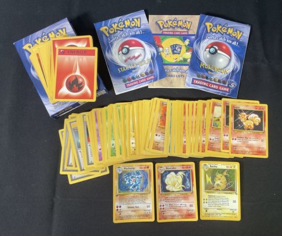 Lot 521 - A collection of 130+ Pokémon cards including...