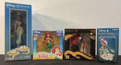 Lot 497 - A group of hand painted Japanese PVC figures...