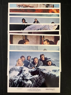 Lot 318 - ISLAND AT THE TOP OF THE WORLD (1974) A group...