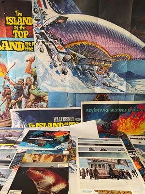 Lot 318 - ISLAND AT THE TOP OF THE WORLD (1974) A group...