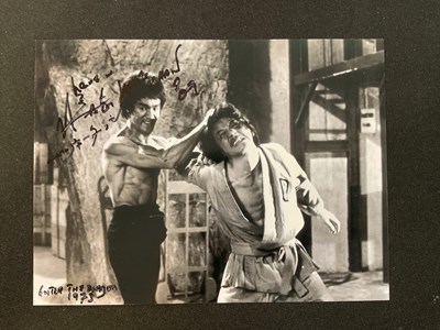 Lot 547 - Two pairs of autographs comprising JACKIE CHAN,...
