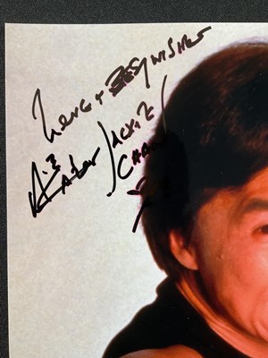 Lot 547 - Two pairs of autographs comprising JACKIE CHAN,...