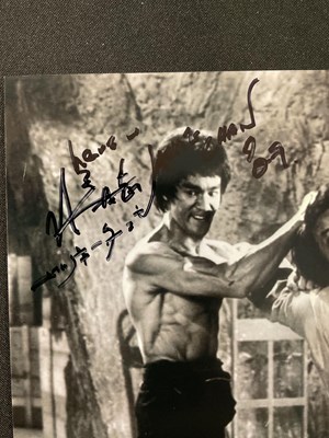 Lot 547 - Two pairs of autographs comprising JACKIE CHAN,...