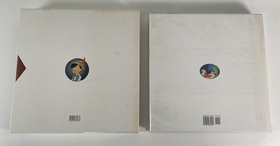 Lot 401 - A pair of Walt Disney art books by PIERRE...