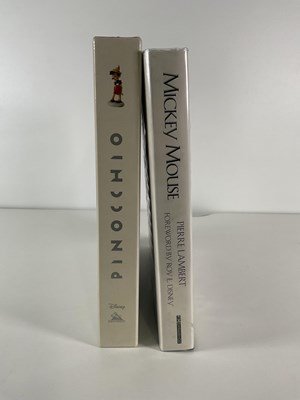 Lot 401 - A pair of Walt Disney art books by PIERRE...