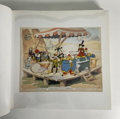 Lot 401 - A pair of Walt Disney art books by PIERRE...