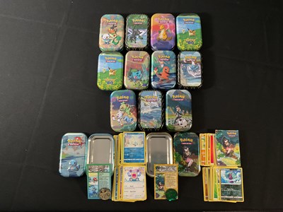 Lot 524A - A collection of 10 tins of Pokémon cards from...