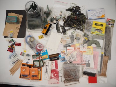 Lot 8 - A large quantity of N gauge track, controllers,...