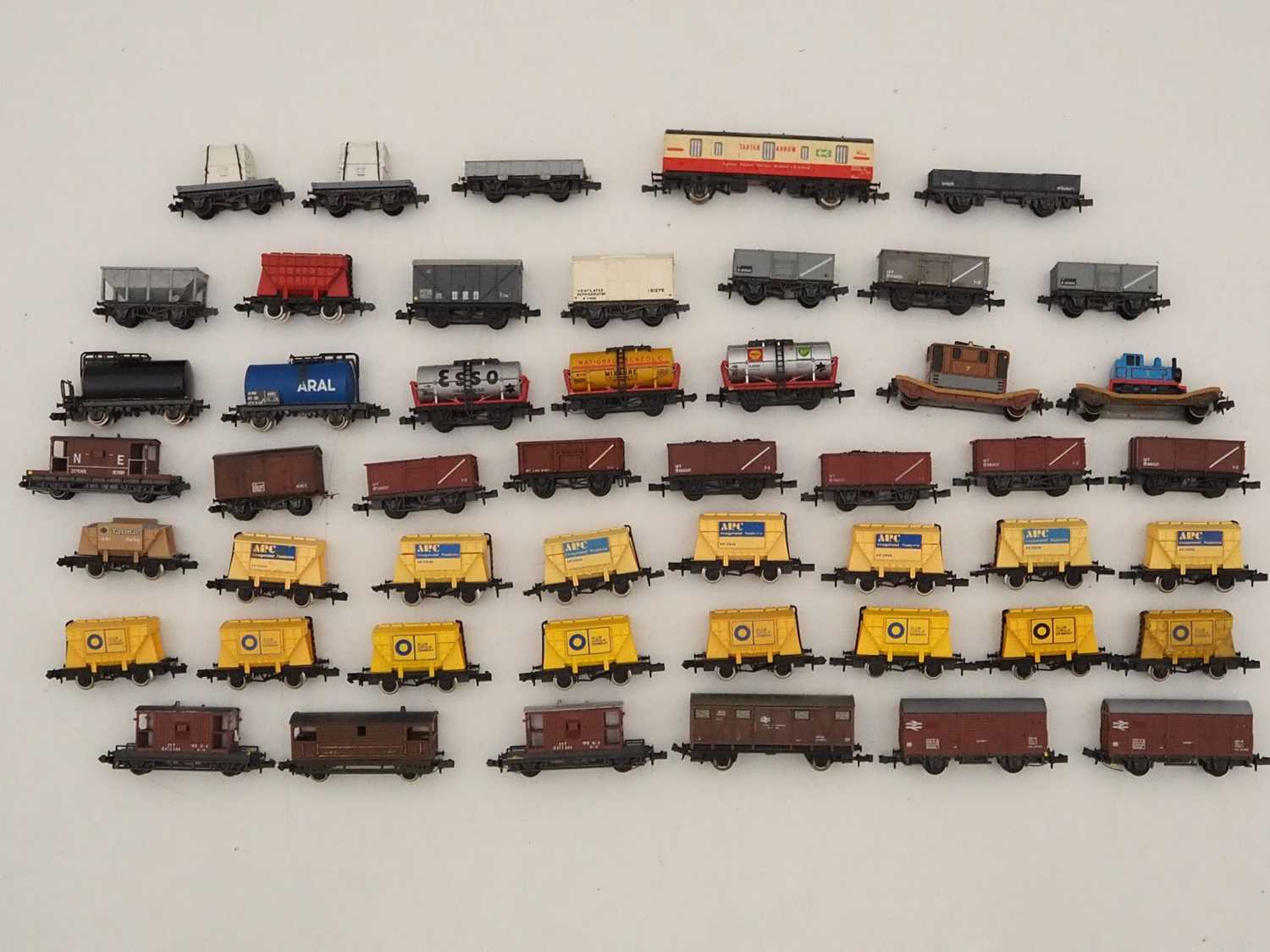 Lot 17 - A group of N gauge mixed wagons by FARISH and...