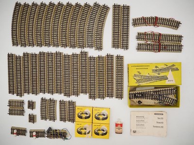 Lot 25 - MARKLIN - A quantity of 3-rail HO M-track plus...