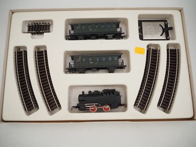 Lot 36 - A vintage 3-rail HO gauge train set with...