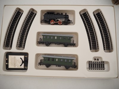 Lot 36 - A vintage 3-rail HO gauge train set with...
