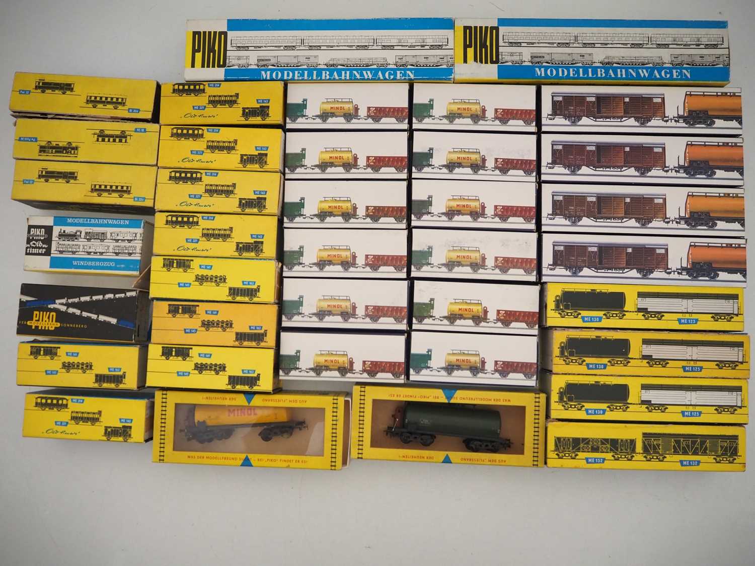 Lot 37 - A group of boxed PIKO HO gauge wagons and...