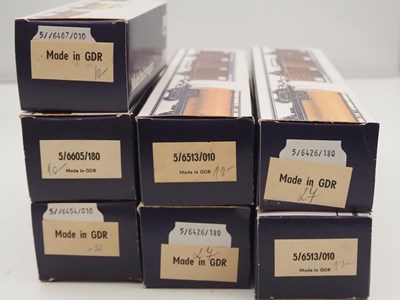 Lot 37 - A group of boxed PIKO HO gauge wagons and...