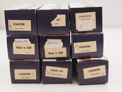 Lot 37 - A group of boxed PIKO HO gauge wagons and...