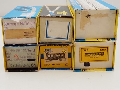 Lot 37 - A group of boxed PIKO HO gauge wagons and...