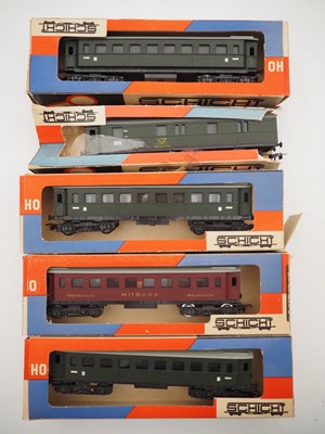 Lot 40 - A group of boxed HO gauge wagons and coaches...