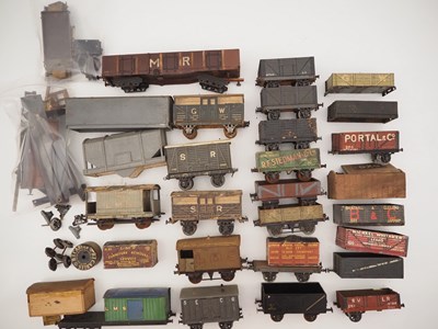 Lot 220 - A group of O gauge tinplate and wooden wagons...