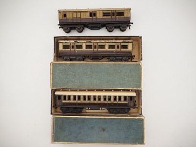 Lot 230 - BASSETT LOWKE - a group of LNWR tinplate O...