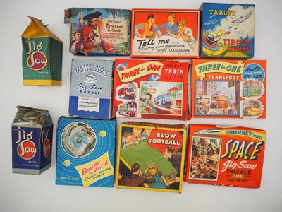 Lot 255 - A group of boxed vintage jigsaw puzzles and...