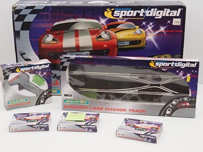 Lot 288 - SCALEXTRIC - A Sport Digital group comprising...