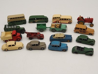 Lot 341 - A group of playworn DINKY diecast cars, buses,...