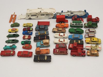 Lot 355 - A group of playworn CORGI diecast cars, buses,...