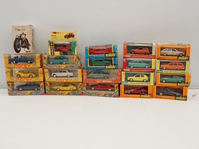 Lot 356 - A group of boxed diecast cars and a motorcycle...