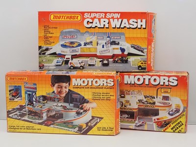 Lot 494 - MATCHBOX - Playsets 2 x 'Motors' (one in...