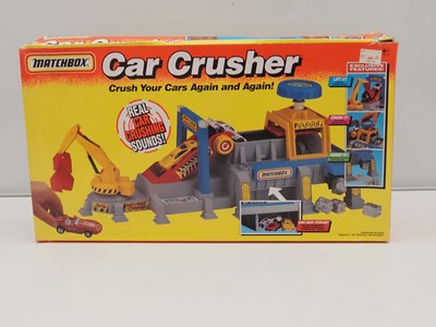 Lot 497 - MATCHBOX - Playsets 'Motors' , 'Car Crusher'...