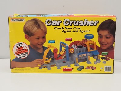 Lot 497 - MATCHBOX - Playsets 'Motors' , 'Car Crusher'...