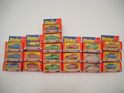Lot 504 - DINKY diecast cars in later red/blue window...