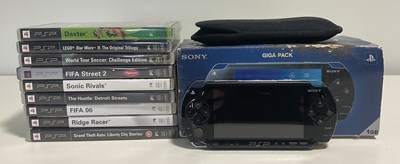 Lot 537 - A boxed SONY PSP giga pack together with 9...