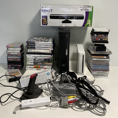 Lot 543 - A mixed selection of retro gaming consoles and...