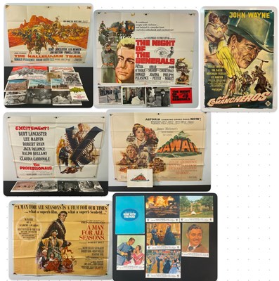 Lot 124 - A group of movie posters and film advertising...