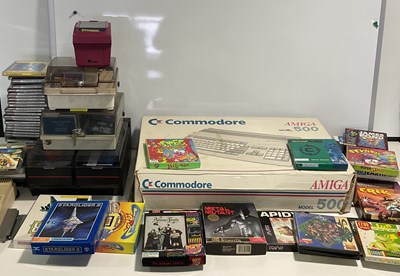 Lot 516 - A COMMODORE AMIGA 500, boxed together with a...