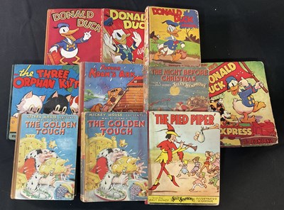 Lot 294 - A collection of WALT DISNEY publications from...