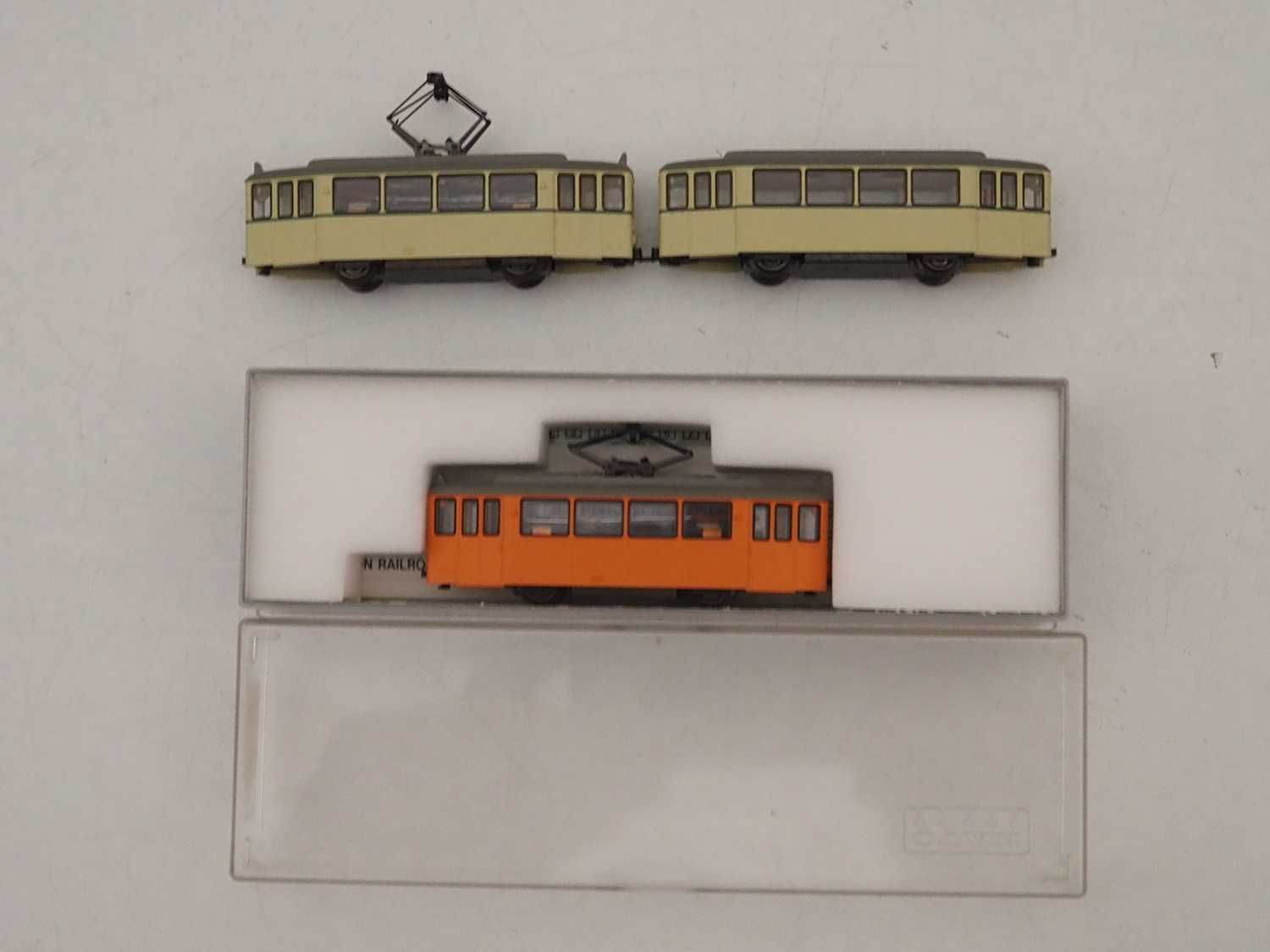 Lot 26 - A KATO N gauge 4 wheel tram car together with...
