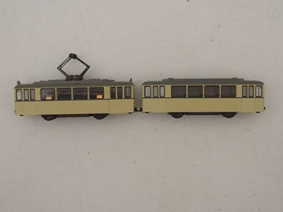 Lot 26 - A KATO N gauge 4 wheel tram car together with...