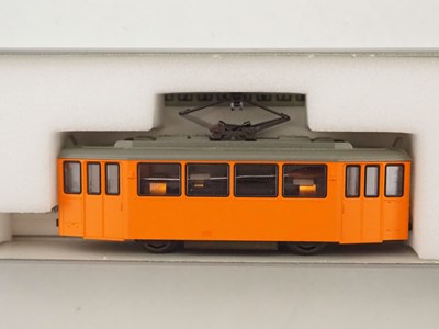 Lot 26 - A KATO N gauge 4 wheel tram car together with...